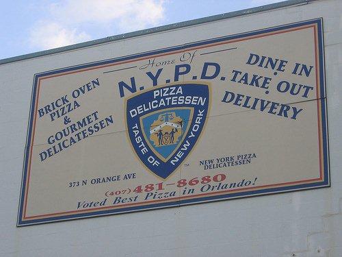 Image of the first NYPD Pizza Billboard on Orange Ave in Downtown Orlando.